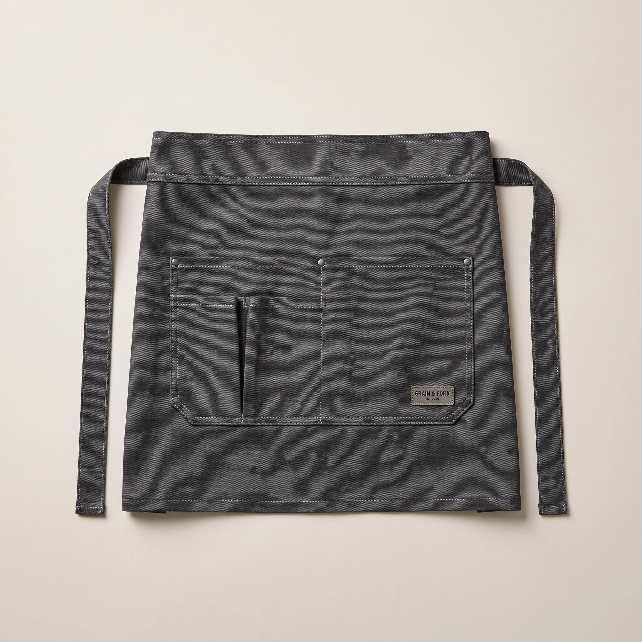 Charcoal waist server apron with divided front pockets and fabric ties