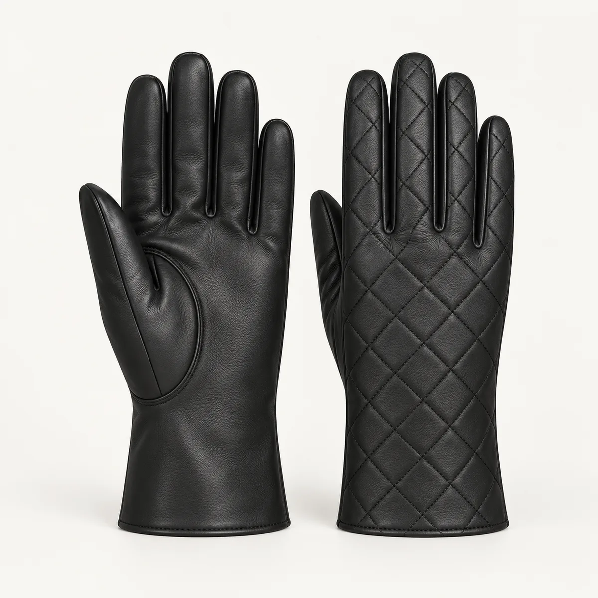 Black leather dress gloves with quilted back stitching and smooth palm